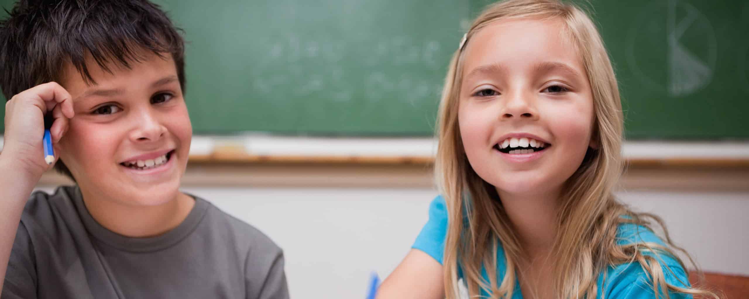photodune-8381526-two-children-writing-xxl-cropv