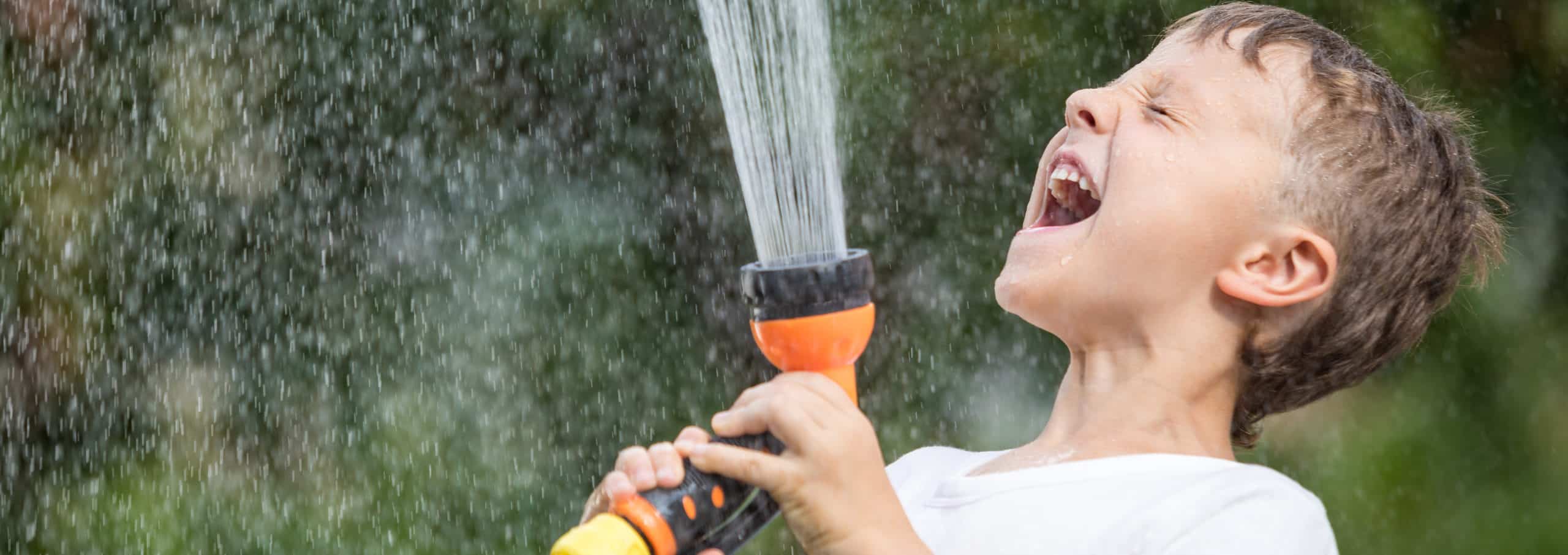 Boy-Spraying-Water