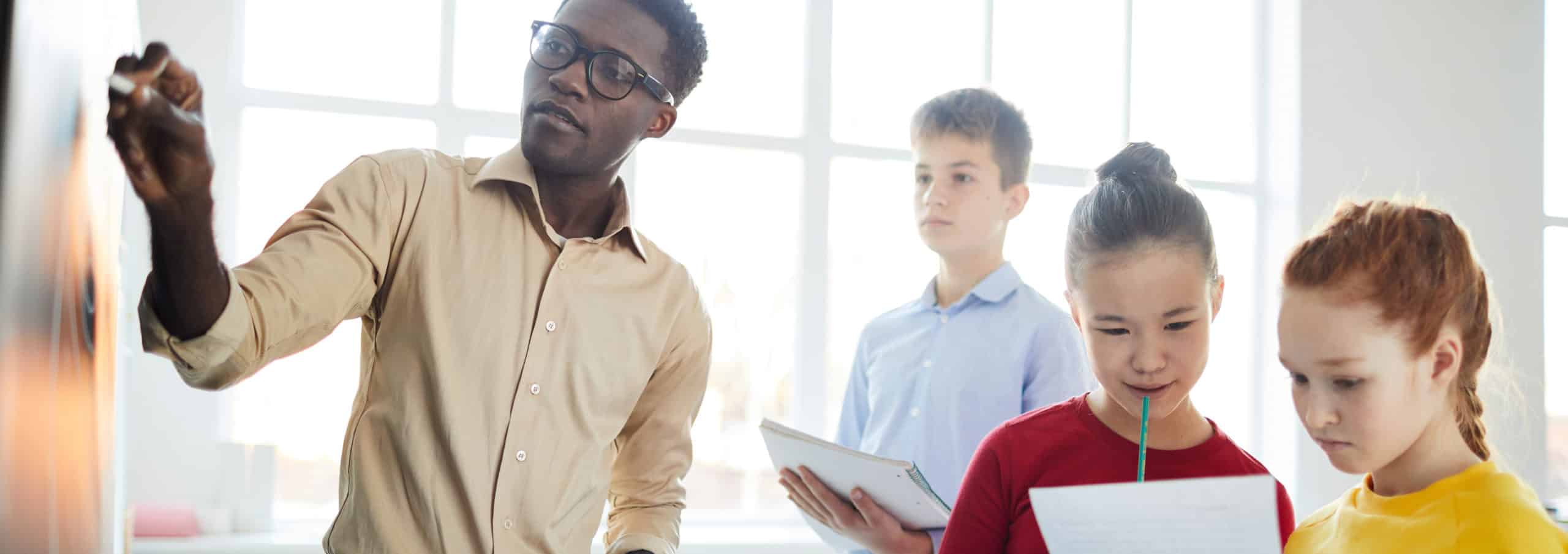 teacher-and-students-writing
