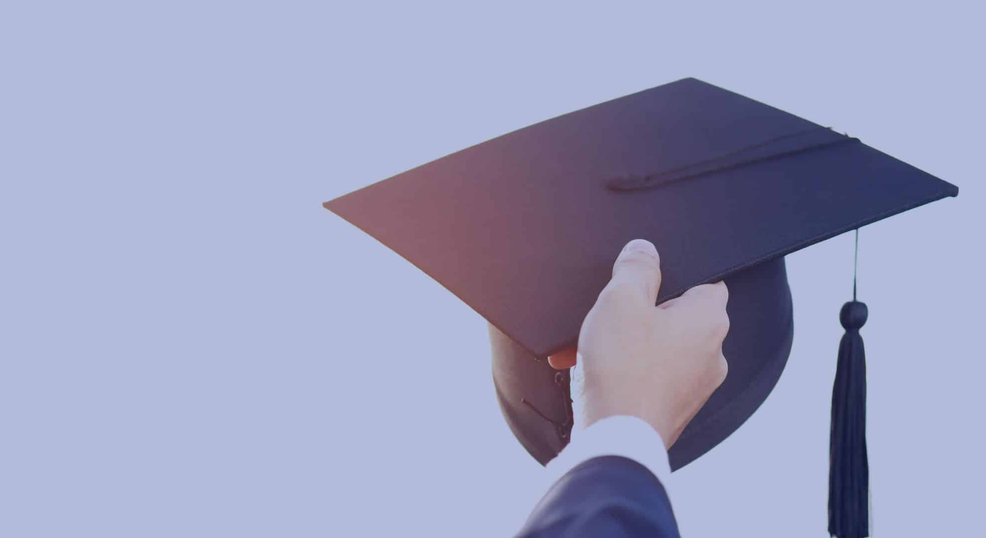 Arm Holding graduation Hat